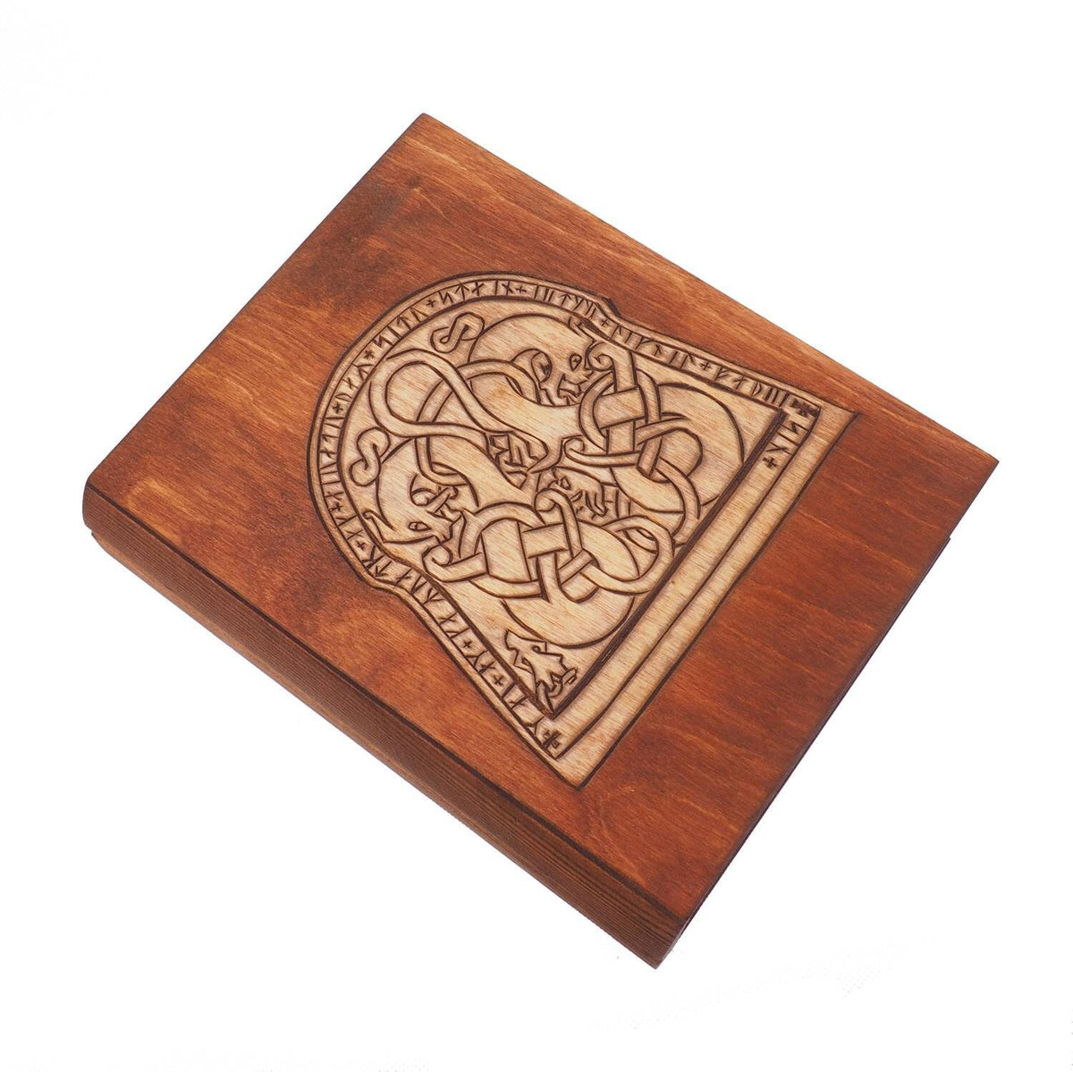 Historical wooden box in the shape of a book with  runestone
