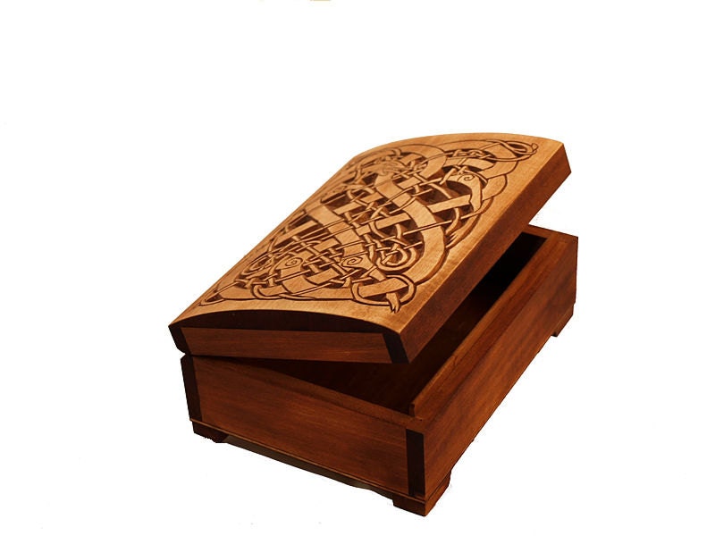 Historic wooden jewelry box featuring Urnes dragons