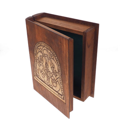 Historical wooden box in the shape of a book with  runestone