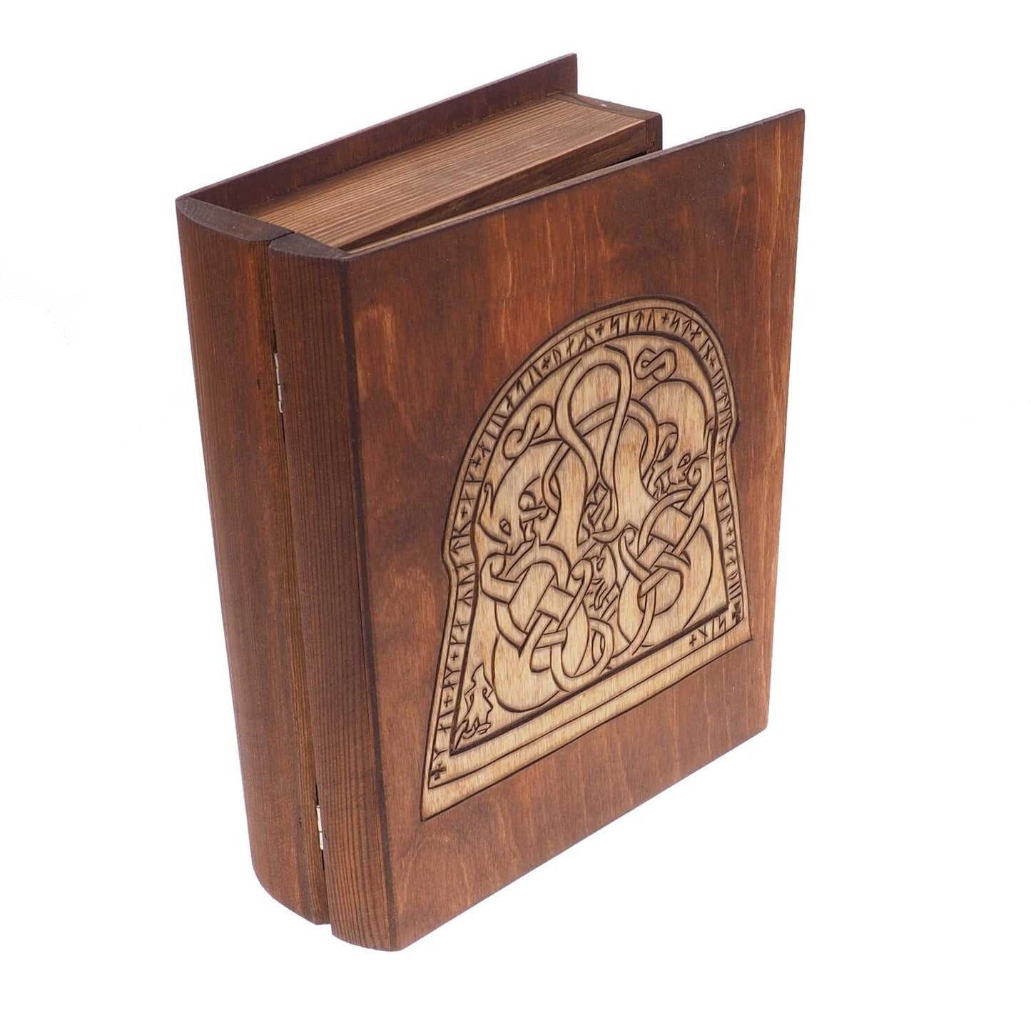 Historical wooden box in the shape of a book with  runestone