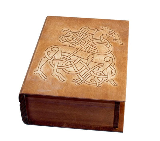 Historical wooden box in the shape of a book with Urnes Dragons