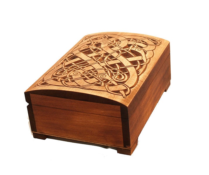 Historic wooden jewelry box featuring Urnes dragons