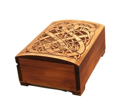 Historic wooden jewelry box featuring Urnes dragons