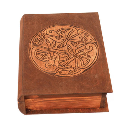 Historical wooden box in the shape of a book with  3 Dogs Book of Kells