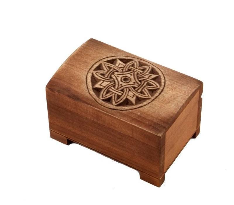 wooden historical jewelry box with solar pattern