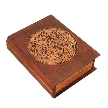 Historical wooden box in the shape of a book with  3 Dogs Book of Kells