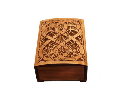 Historic wooden jewelry box featuring Urnes dragons